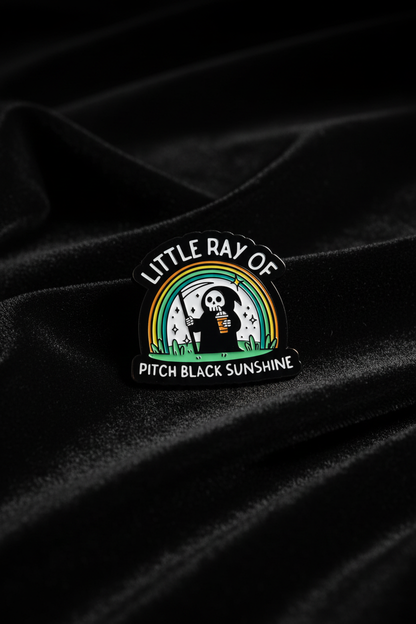 Black sunshine pin på sammet