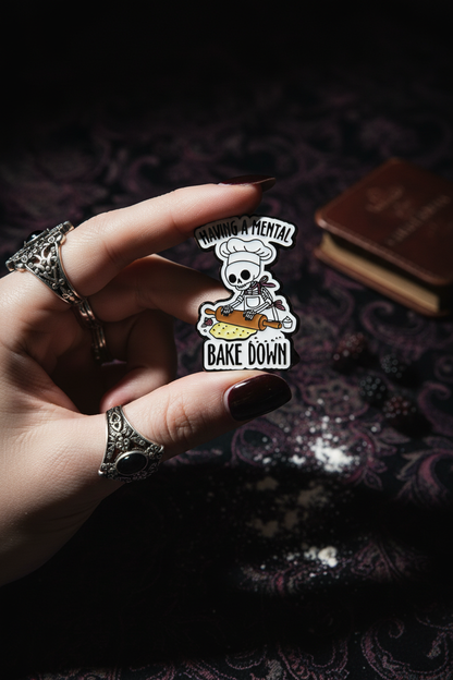 Hand håller pin